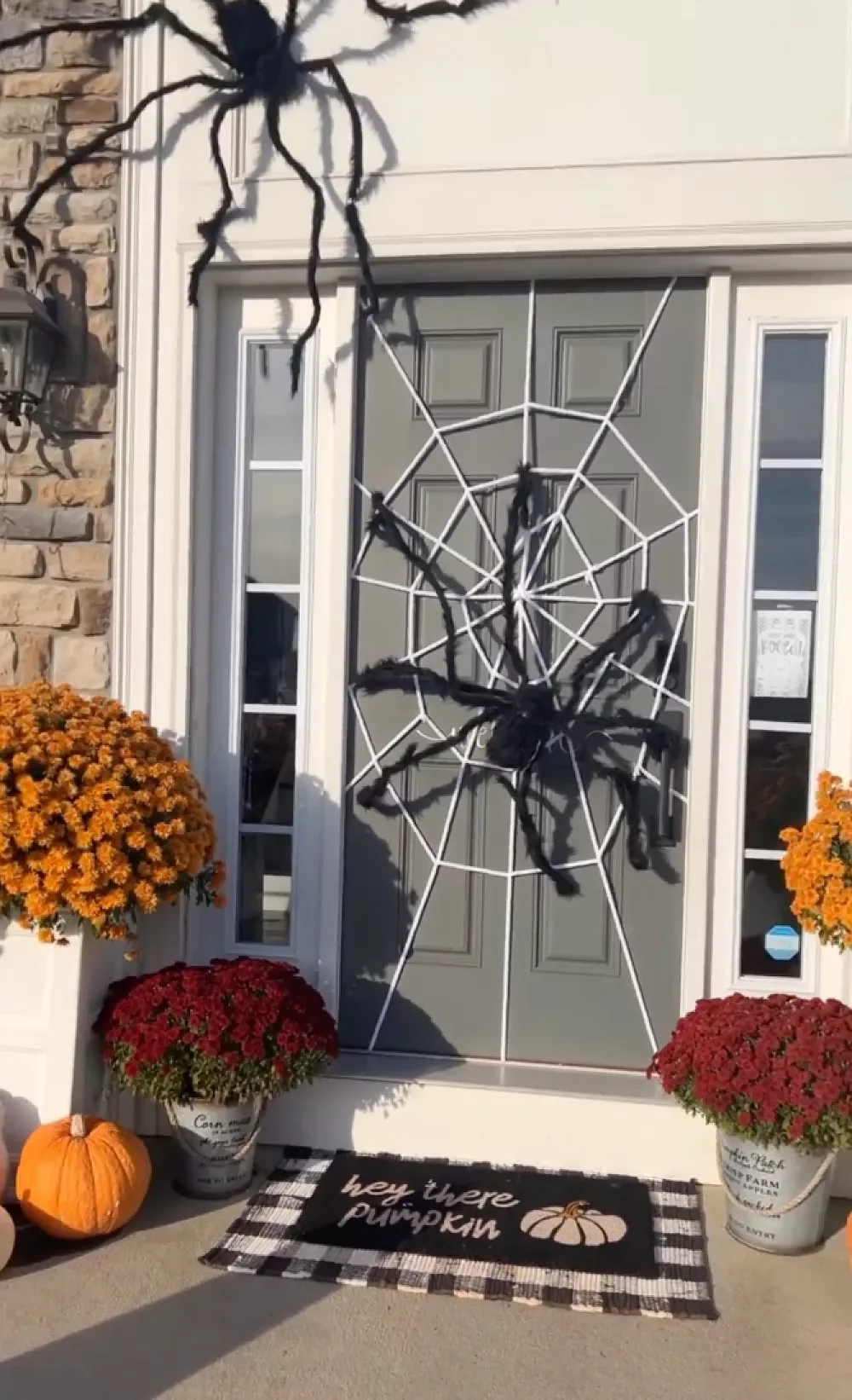 42 Quick Halloween Door Decorations You Can Create in Under an Hour 32 Spider Web Door