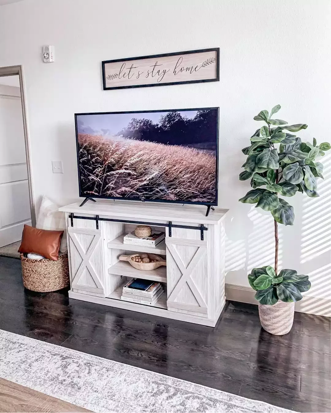 22 Beautiful Ways to Style Your Farmhouse TV Stand That'll Transform Your Space 9 Stack Books