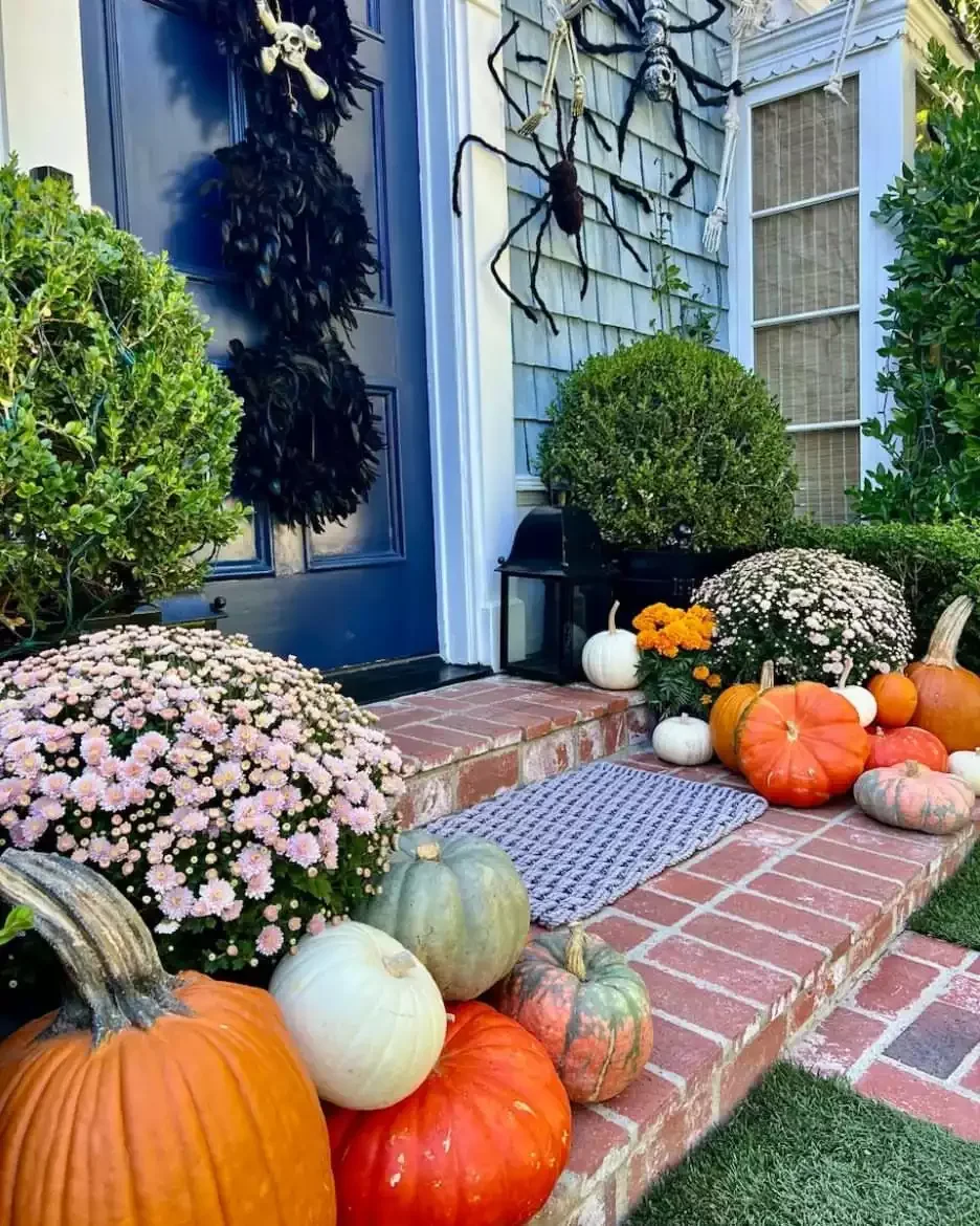 52 Autumn Front Porch Ideas That Will Transform Your Home's Entrance This Fall 19 Stack Three Wreaths