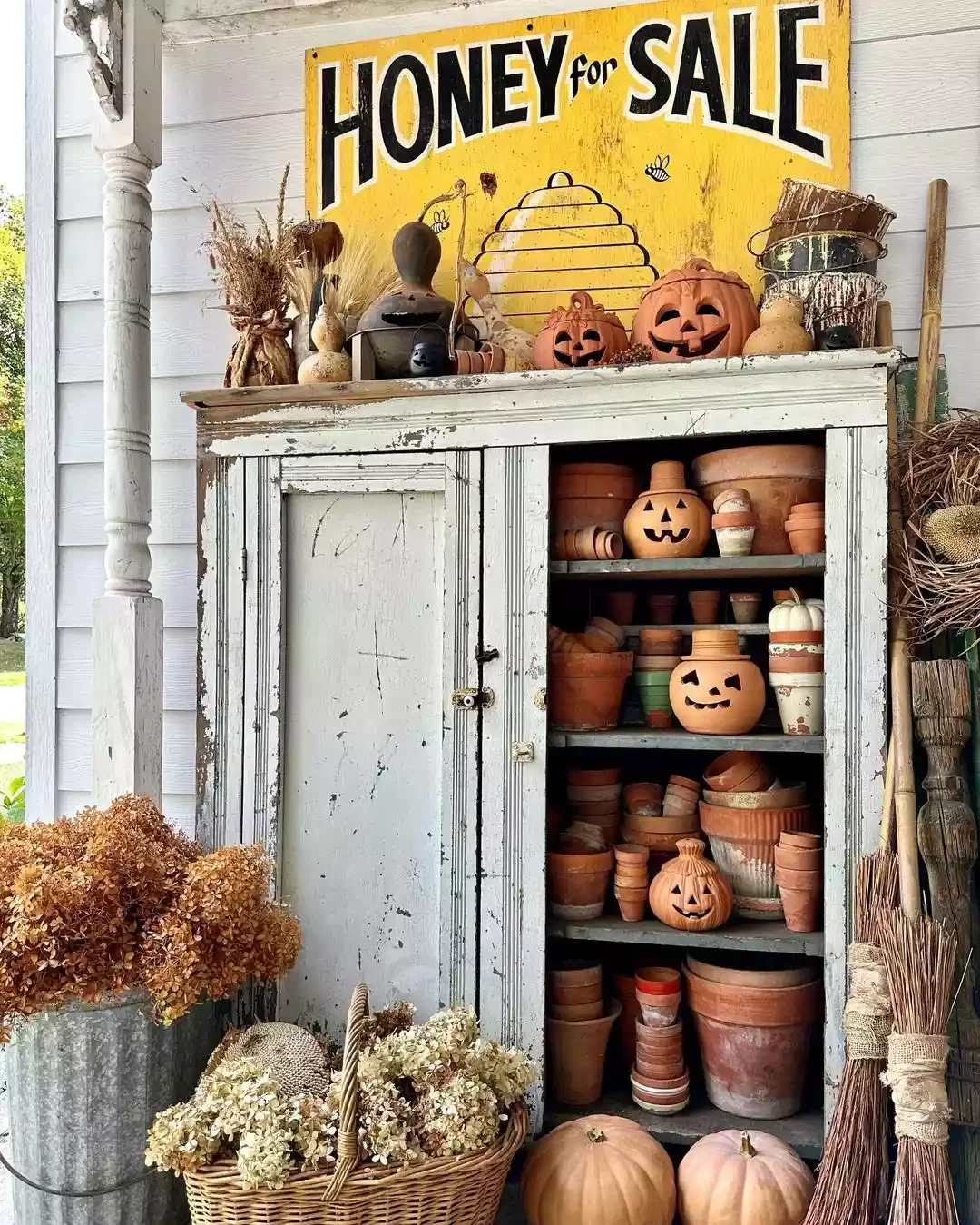 52 Autumn Front Porch Ideas That Will Transform Your Home's Entrance This Fall 38 Start a Terracotta Pumpkin Collection
