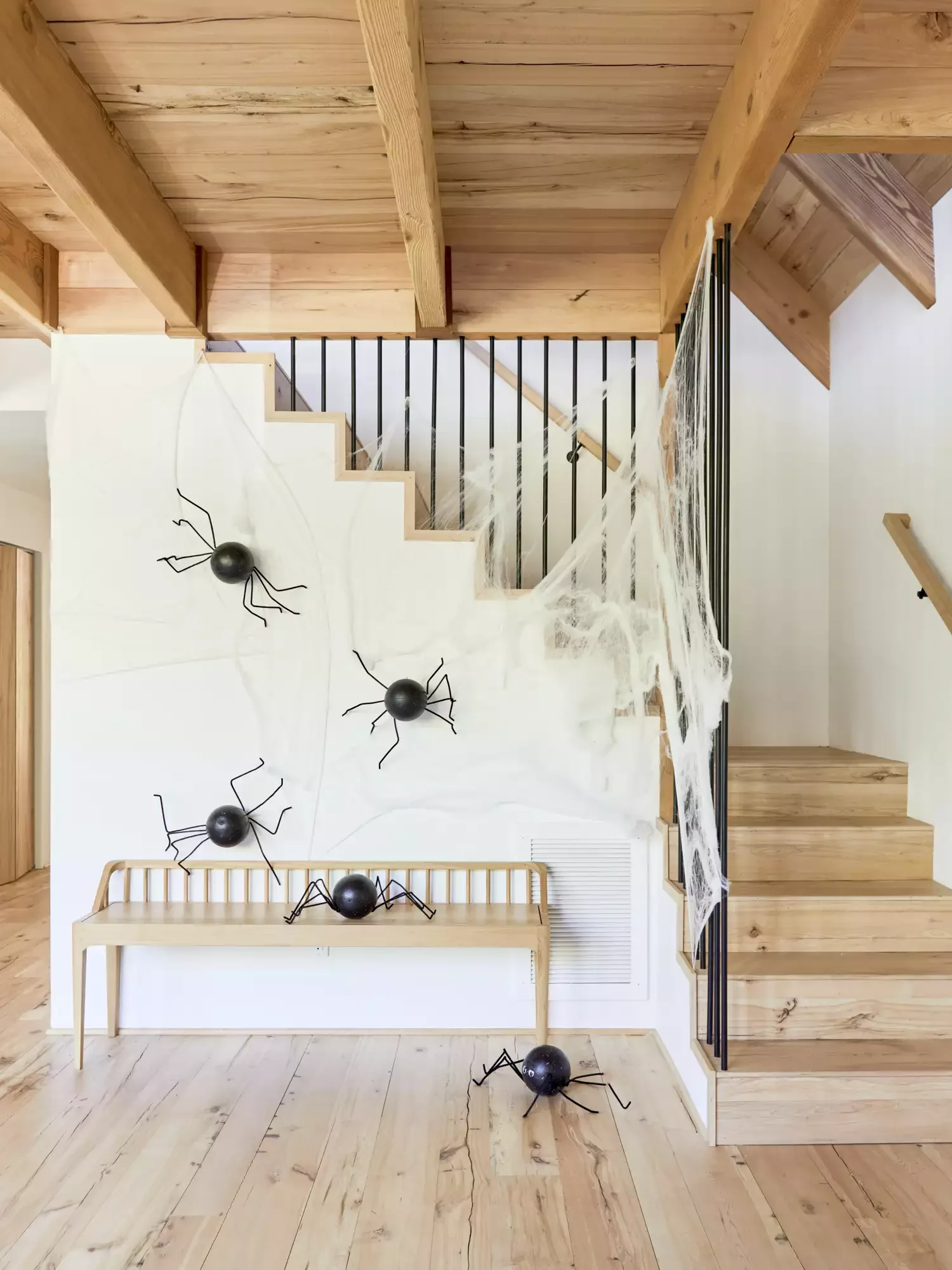 28 Creative Halloween Decorating Ideas You'll Want to Try Right Now 3 Startling Spider Wall