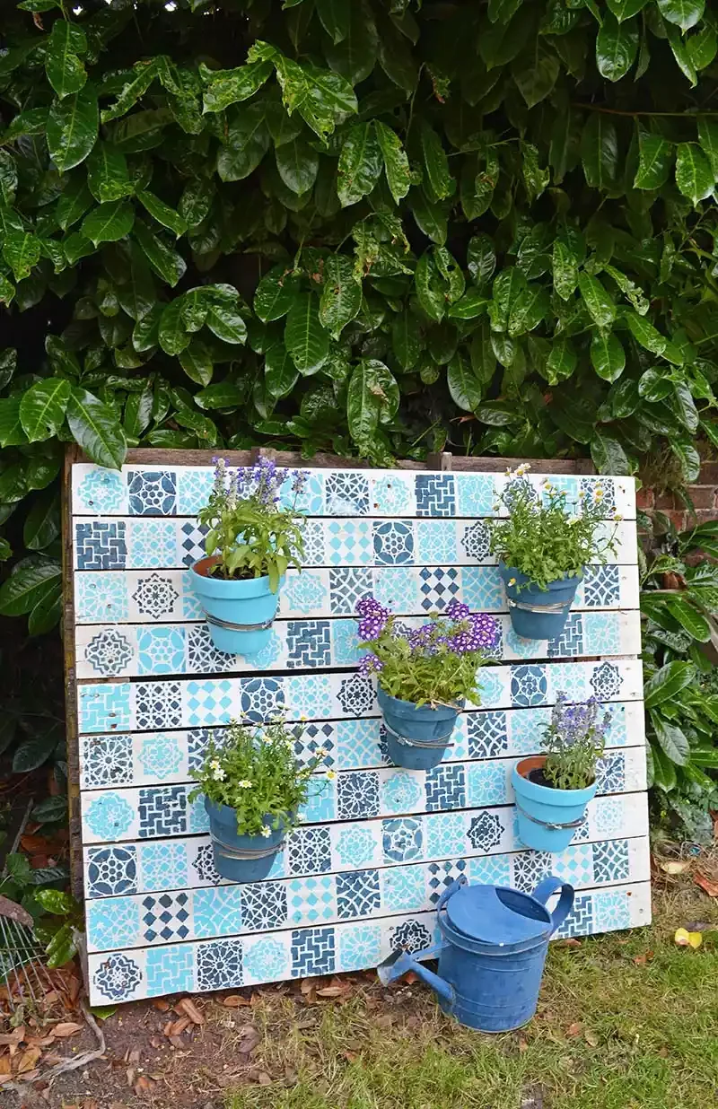 28 Creative DIY Vertical Garden Projects to Transform Your Space Stenciled Vertical Garden