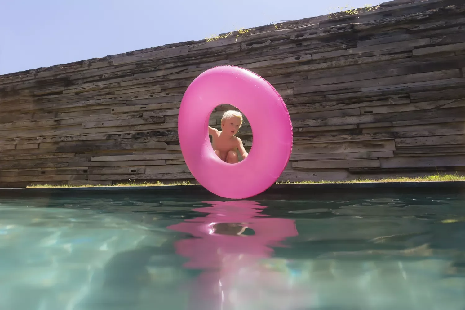 26 Beautiful Pool Barrier Ideas to Transform Your Backyard 15 Stone Mosaic Wall