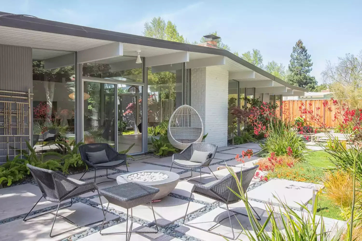 26 Stunning Stone Patio Designs Perfect for Every Outdoor Space 15 Stone Patio With Concrete and Pebbles