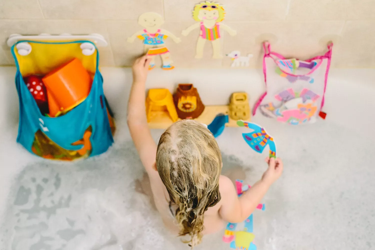 30 Budget-Friendly Organization Hacks That Will Transform Your Home Store Bath Toys in a Mesh Net