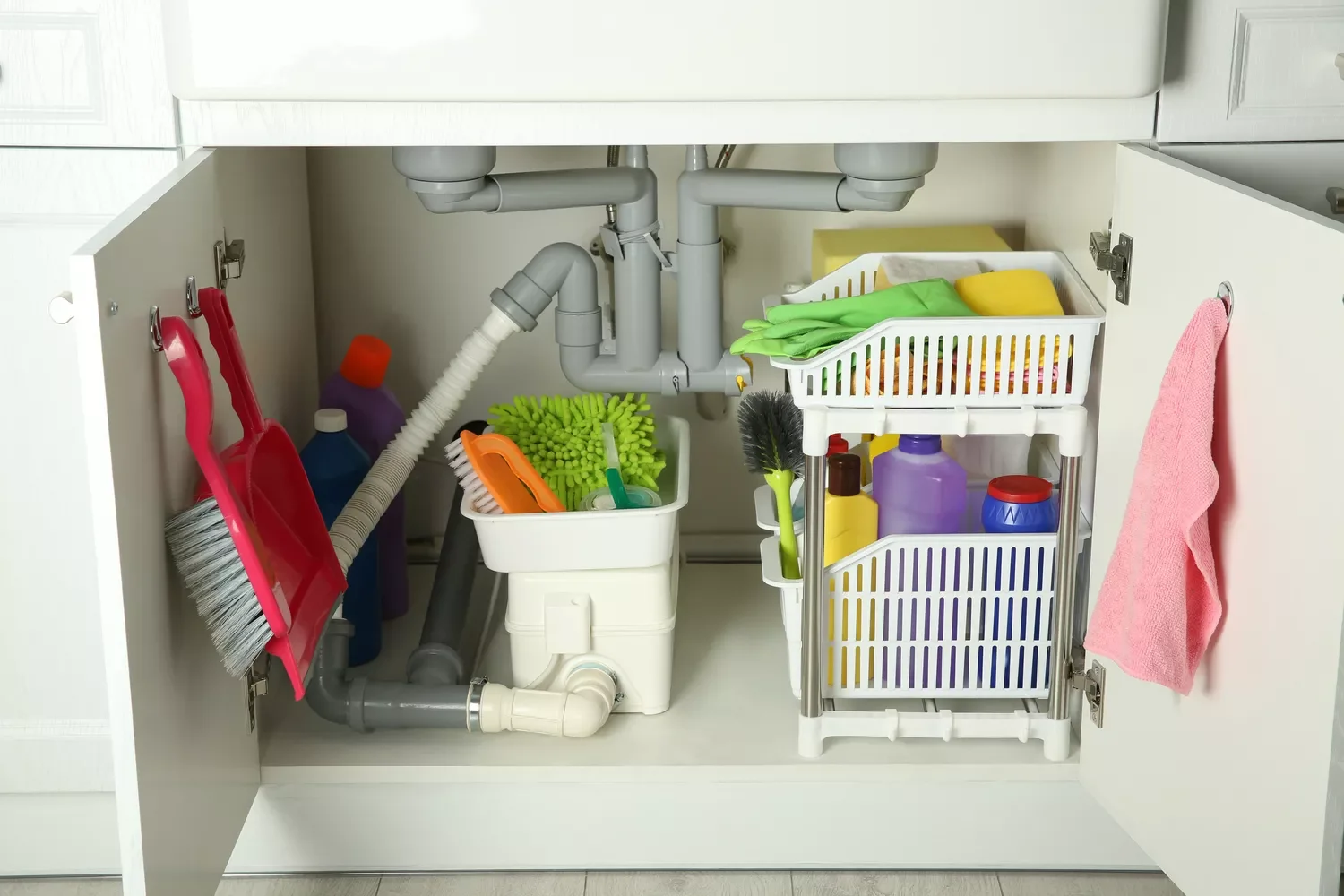 20 Clever Ways to Store Your Mops and Brooms Like a Pro Store Small Brooms and Dustpans Under the Sink