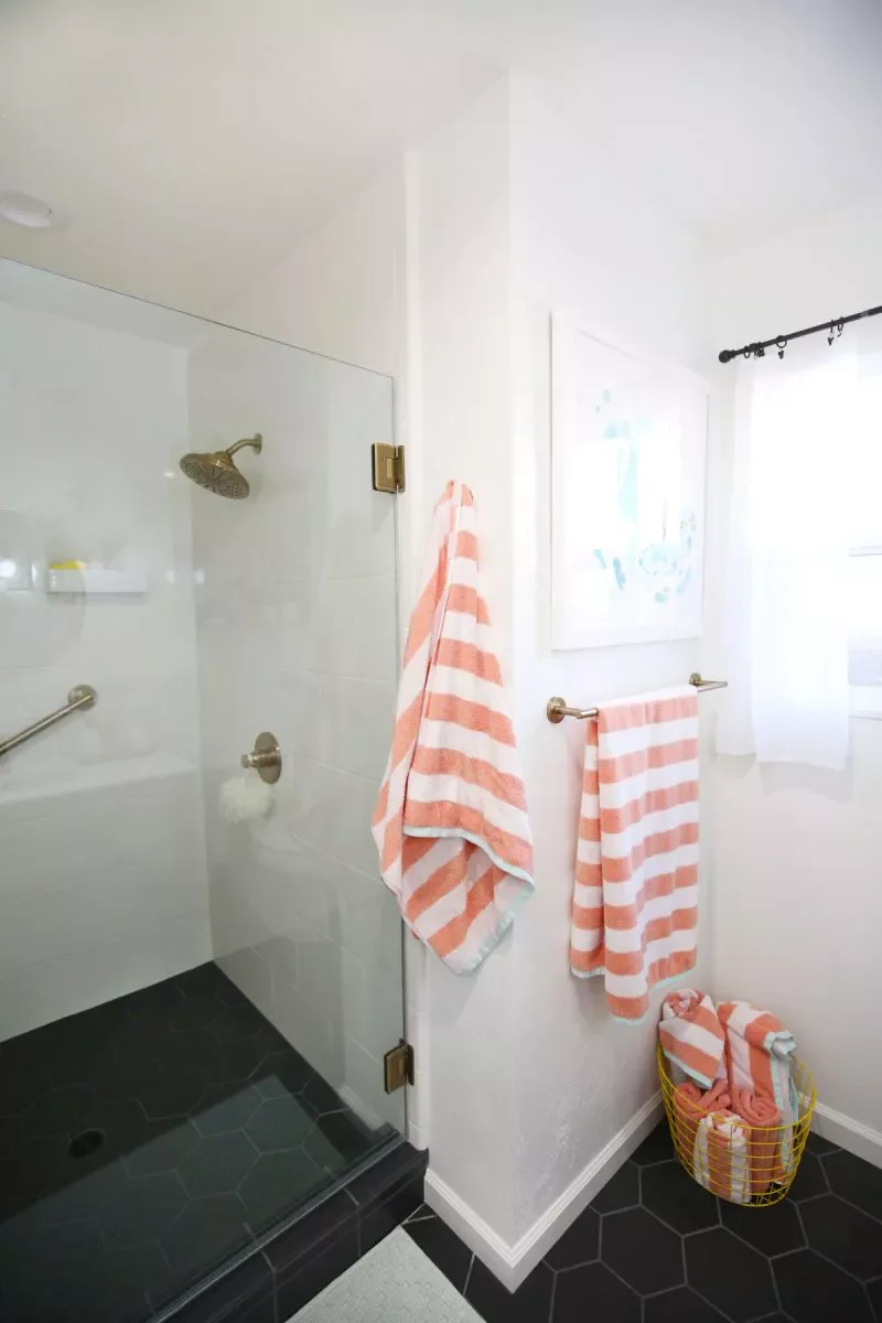 43 Smart Bathroom Storage Solutions That Maximize Every Inch Store Tires in Wire Baskets