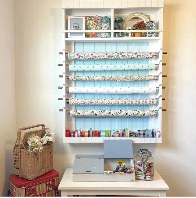 18 Creative Gift Wrap Storage Solutions That Banish Holiday Clutter Store Wrapping Paper on Dowels