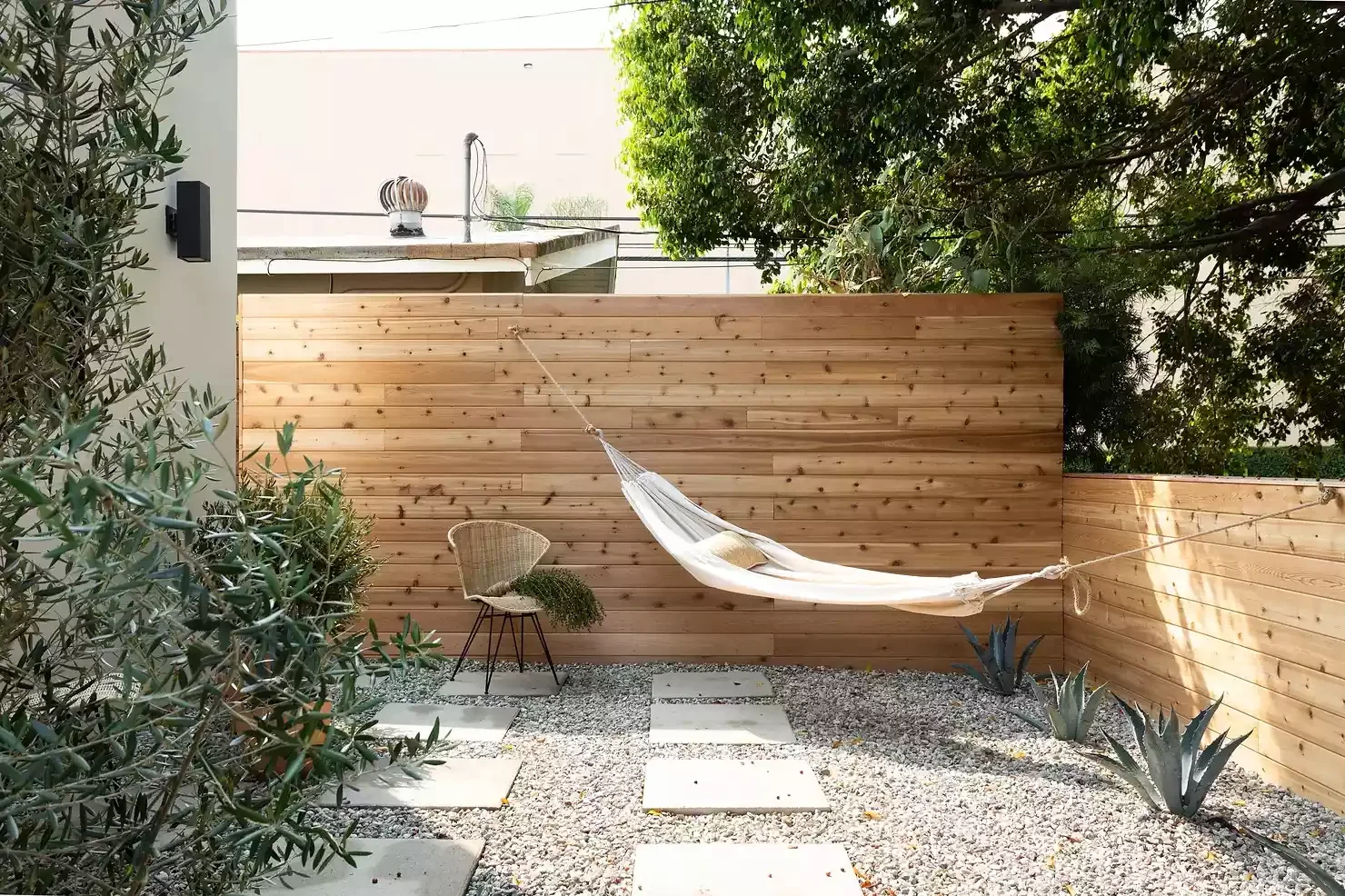 25 Budget Patio Ideas That'll Make Your Neighbors Jealous String Up a Hammock