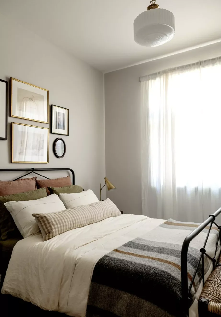 25 Clever Small Primary Bedroom Ideas That Make Your Space Feel Surprisingly Spacious 25 Striped Small Bedroom