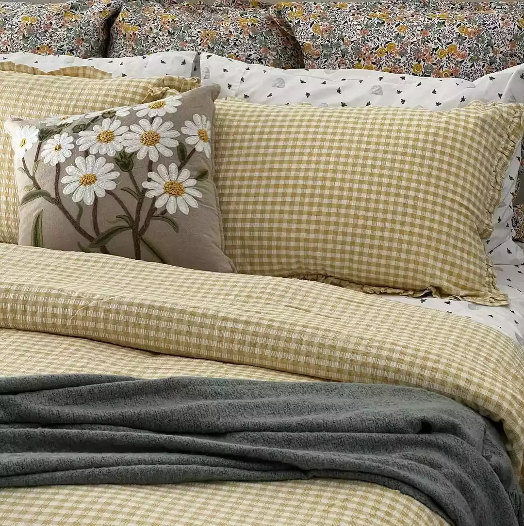 34 Dreamy Cottagecore Bedroom Ideas That Will Make You Want to Redecorate Tonight 27 Style a Handmade Pillow