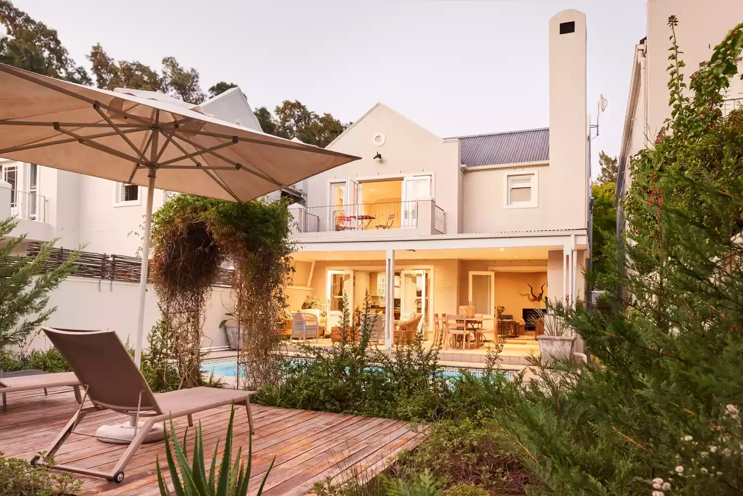 15 Beautiful Floating Deck Designs That Transform Any Outdoor Space 13 Surround It With Greenery