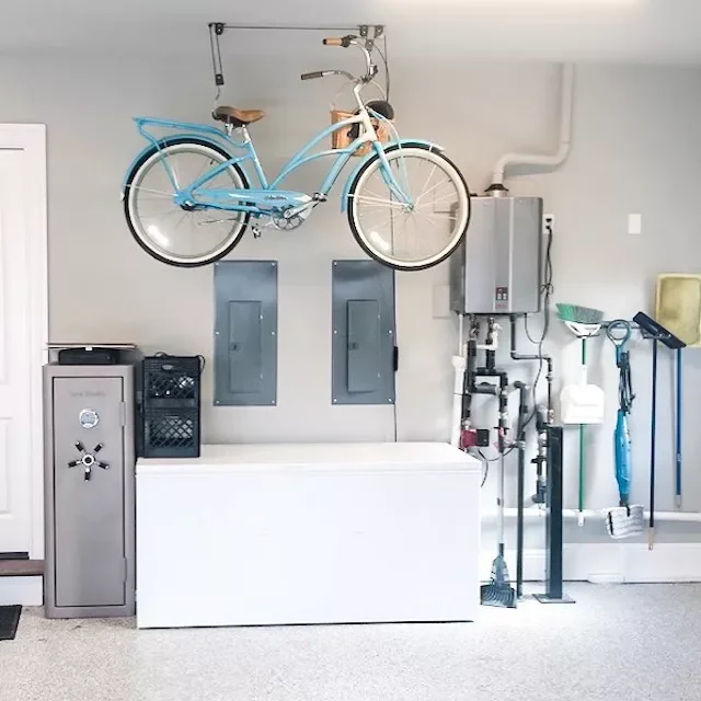 18 Smart Bike Storage Solutions for Your Garage Space Suspend a Bike From the Ceiling