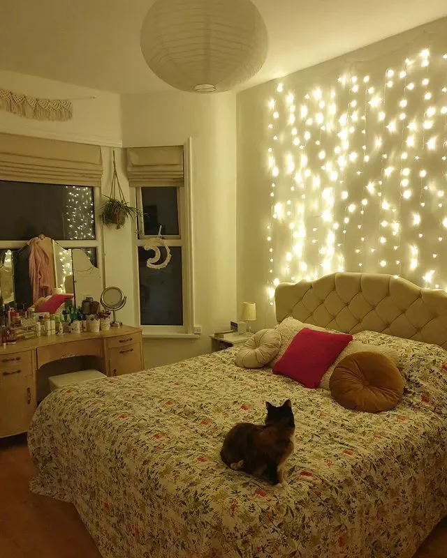37 Beautiful Aesthetic Bedroom Ideas to Transform Your Space 33 Suspend a Tapestry of Lights Behind the Bed