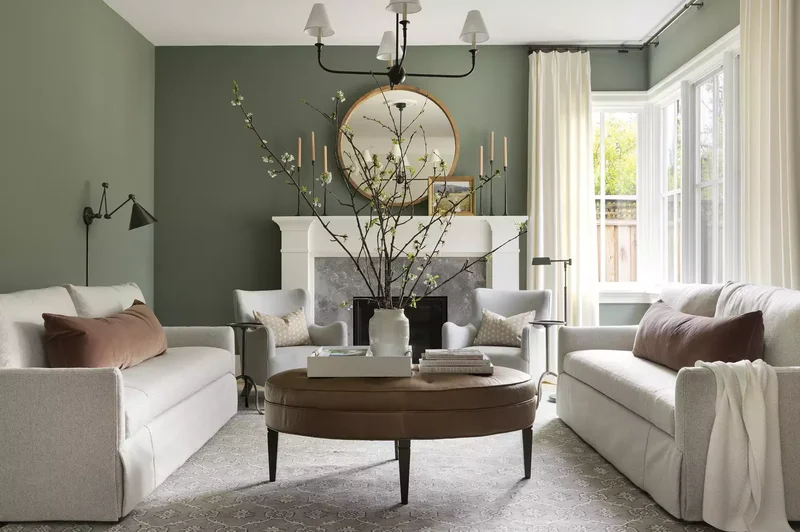 32 Living Room Mantle Decor Ideas That Add Style and Warmth 18 Tall Candlesticks and Gilded Mirror