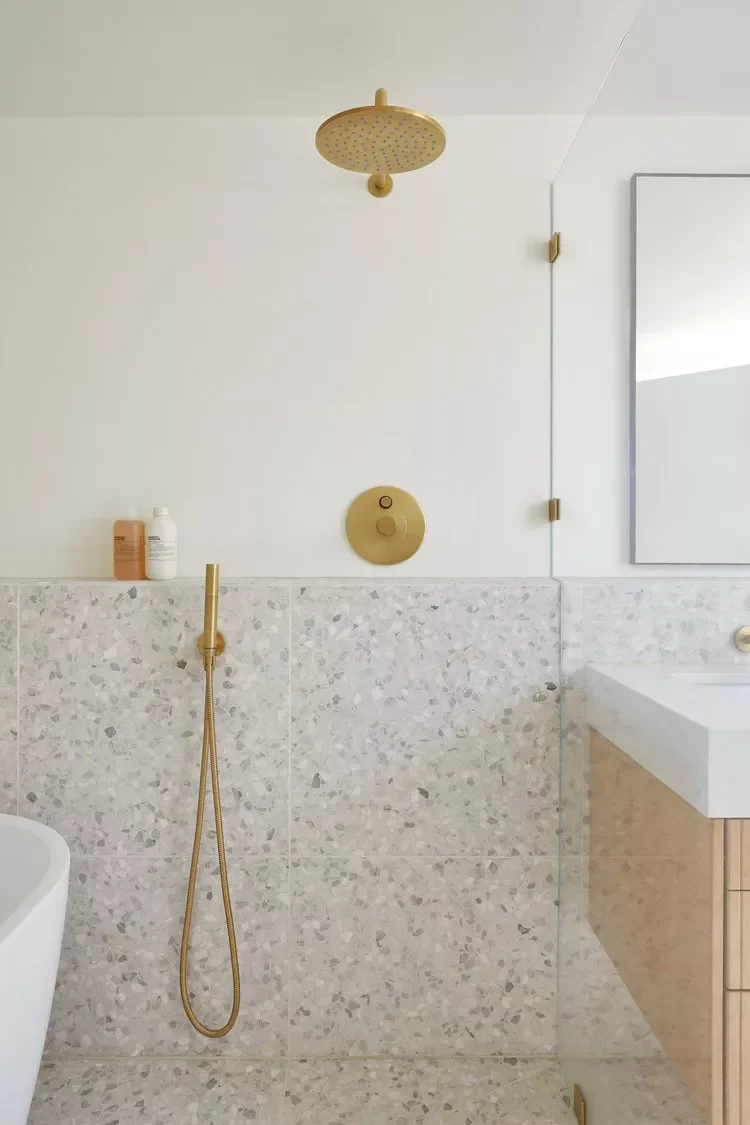 30 Stunning Walk-In Shower Tile Ideas to Transform Your Bathroom 29 Terrazzo Tile Half Wall
