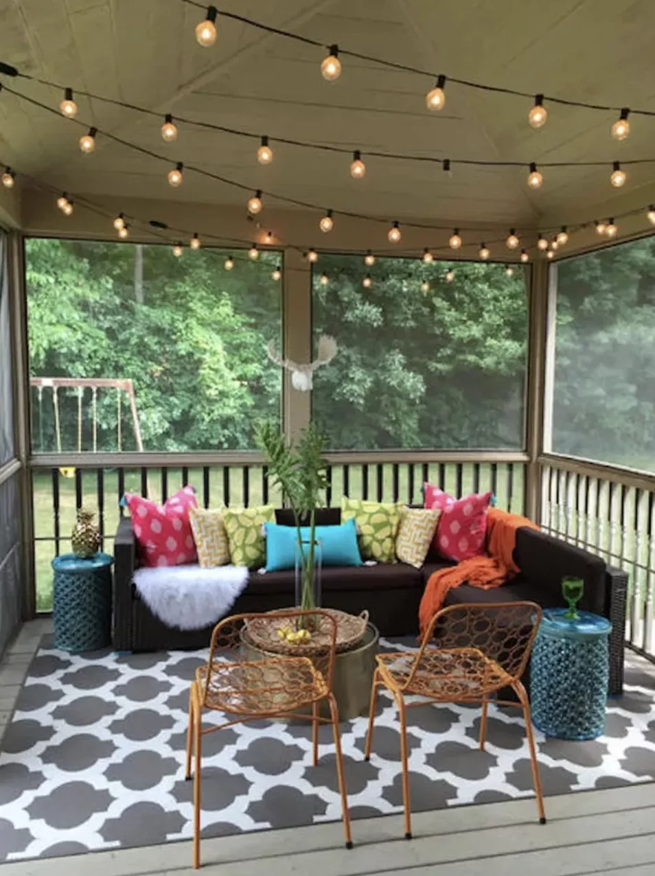 29 Stunning Three-Season Porch Ideas That'll Make You Want to Live Outdoors 12 The Cheerful Hangout