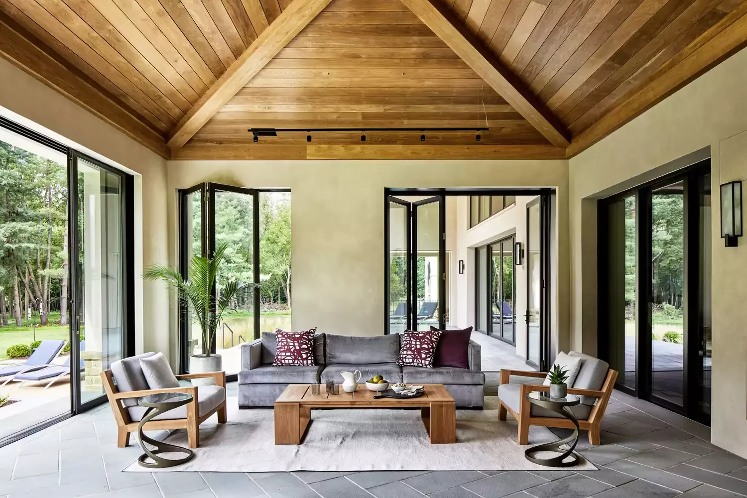 29 Stunning Three-Season Porch Ideas That'll Make You Want to Live Outdoors 14 The Outdoor Living Room
