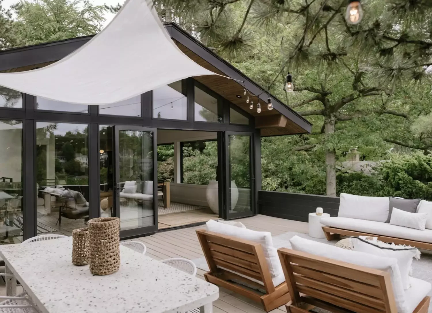 29 Stunning Three-Season Porch Ideas That'll Make You Want to Live Outdoors 21 The Split Deck