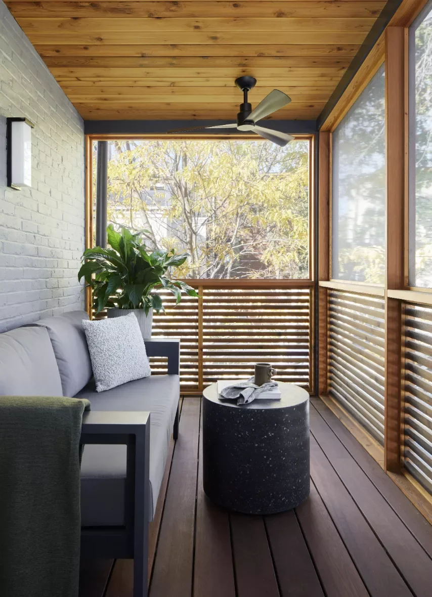 29 Stunning Three-Season Porch Ideas That'll Make You Want to Live Outdoors 4 The Wood-Clad Addition