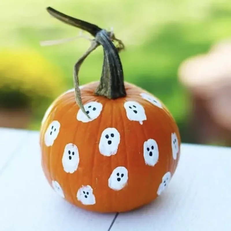 90 Creative Halloween Pumpkin Decorating Ideas to Try This Season 38 Thumbprint Ghost Pumpkin