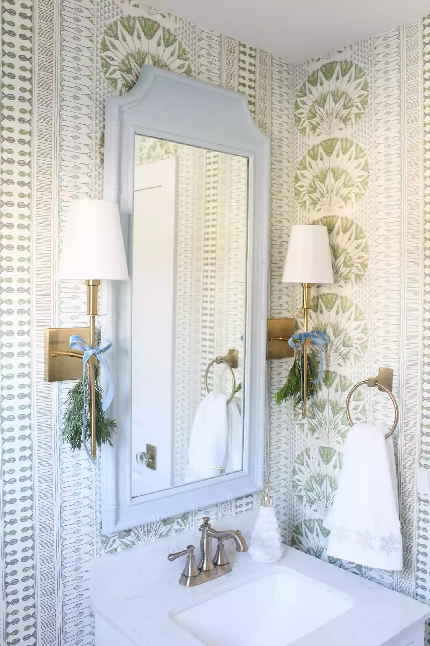 32 Christmas Bathroom Ideas That Create a Holiday Wonderland Tie Sconces With Ribbons