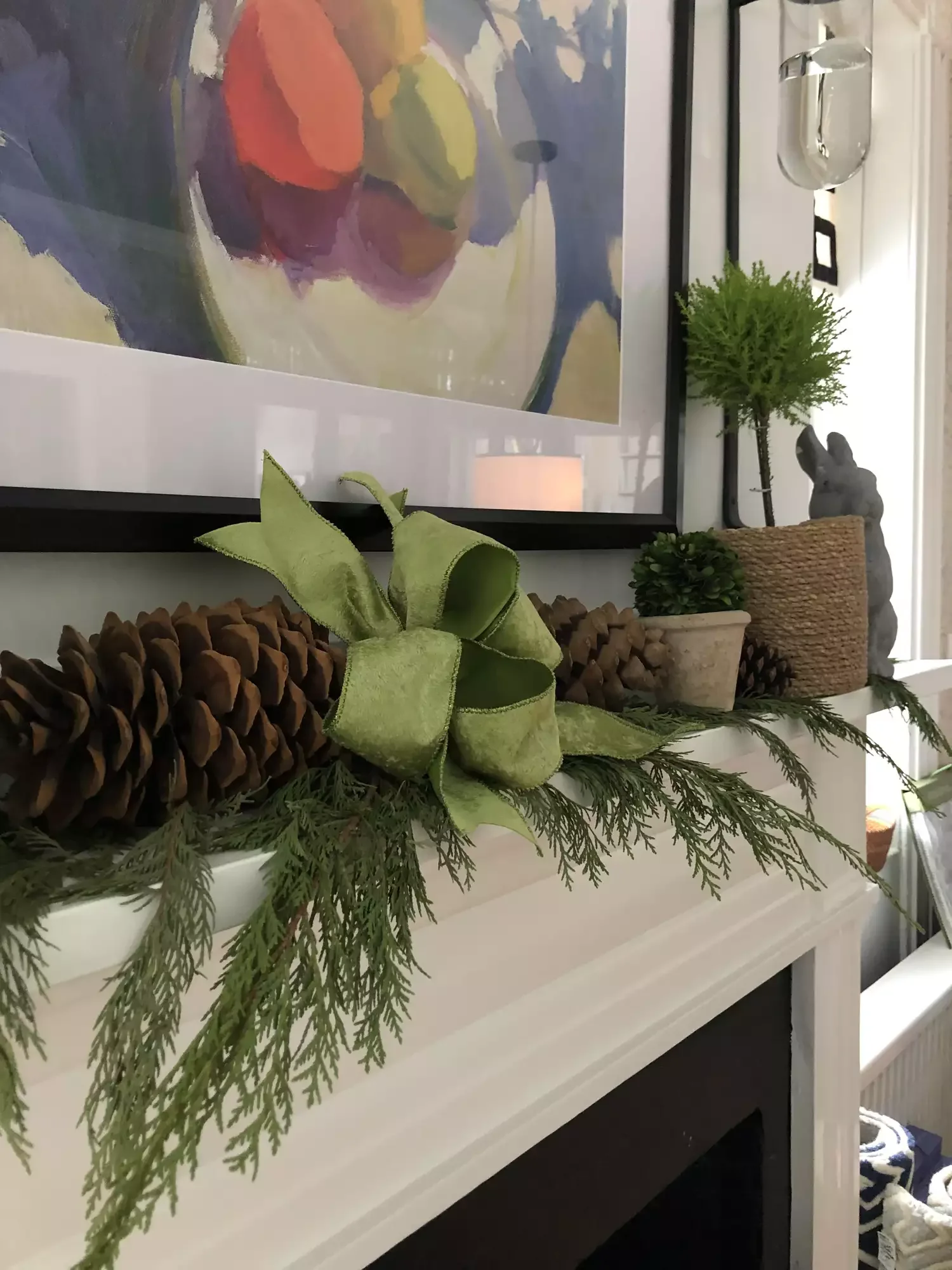 56 Magical Christmas Mantel Decorating Ideas to Transform Your Holiday Home 49 Tie Your Mantel With a Bow