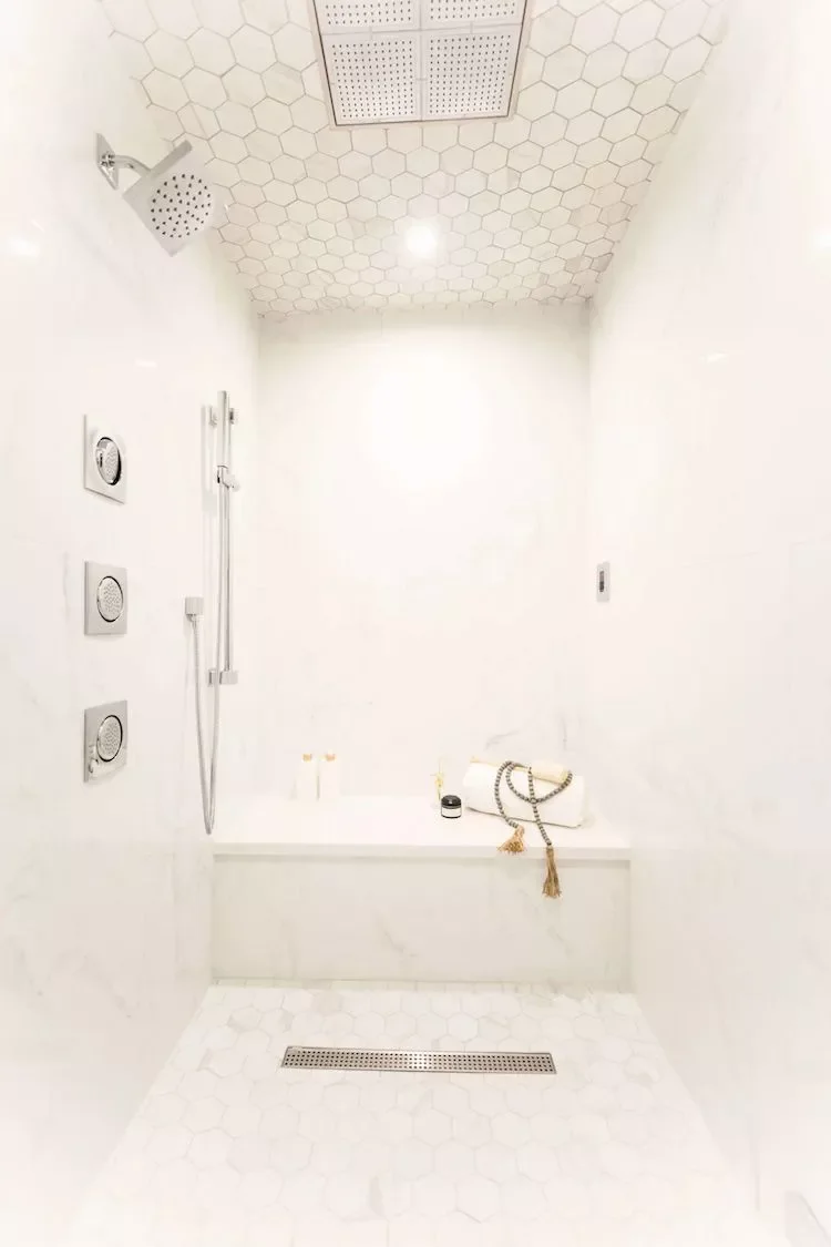 22 Clever Ways to Make Your Narrow Bathroom Feel Spacious and Stylish 7 Tile Every Surface