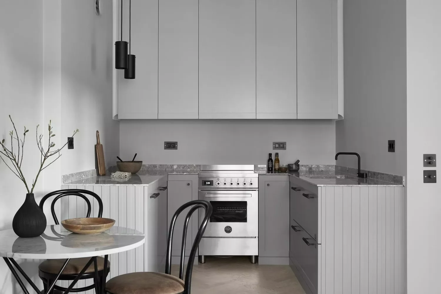 42 Gray Kitchen Ideas That Prove This Neutral Never Goes Out of Style Tonal Light Gray Kitchen