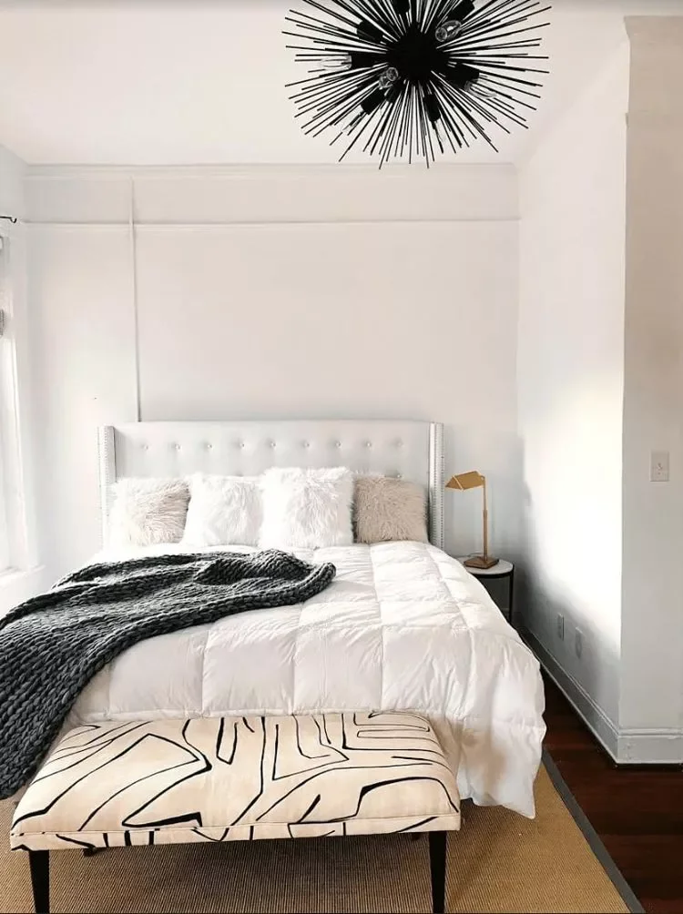 40 Effortless Modern Fall Decorating Ideas That Feel Just Right 5 Top Your Bed With a Chunky Knit Throw