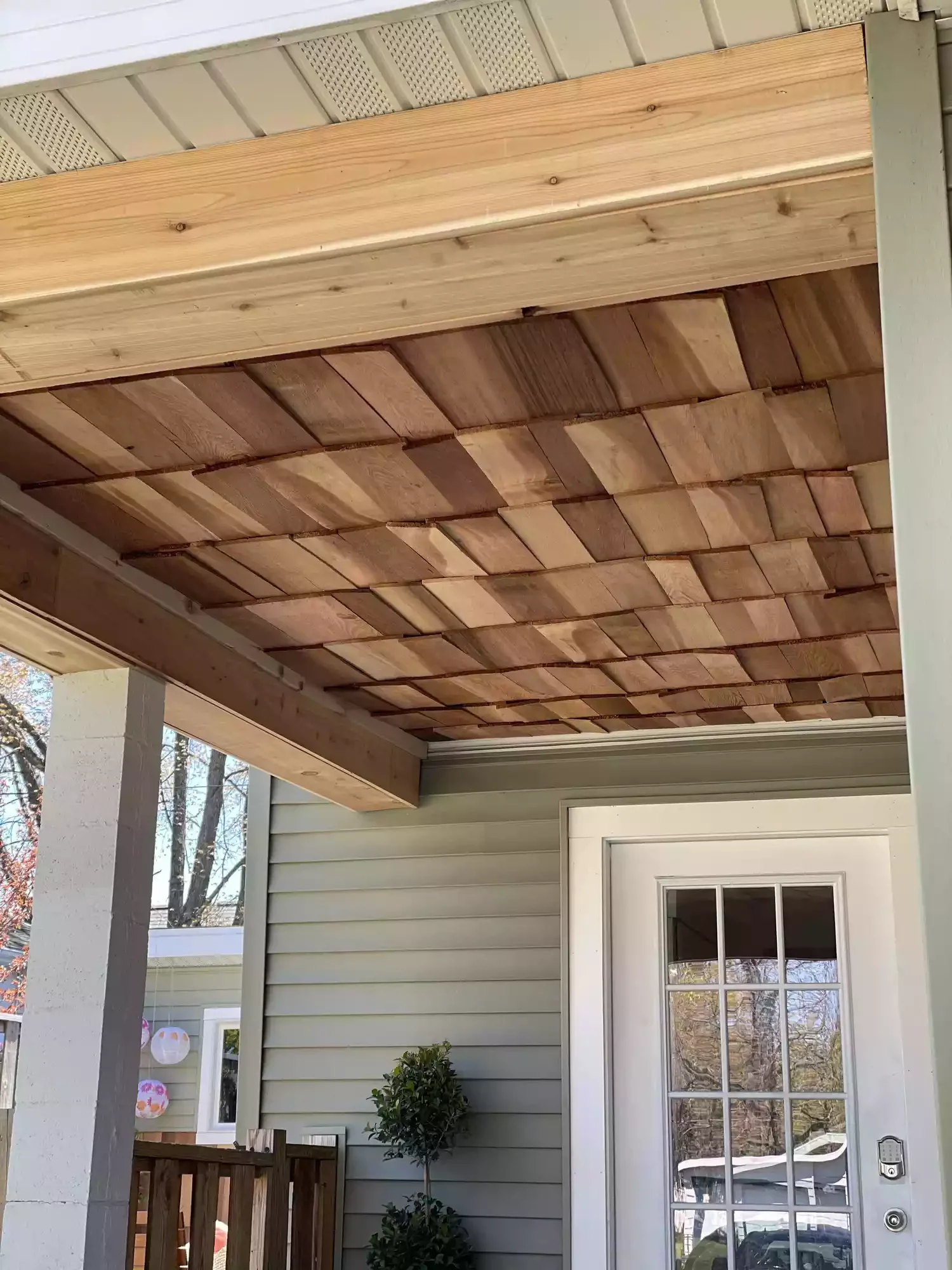 25 Budget-Friendly Porch Ceiling Ideas That'll Transform Your Outdoor Space 15 Transform a Plain Ceiling Using Cedar Shake