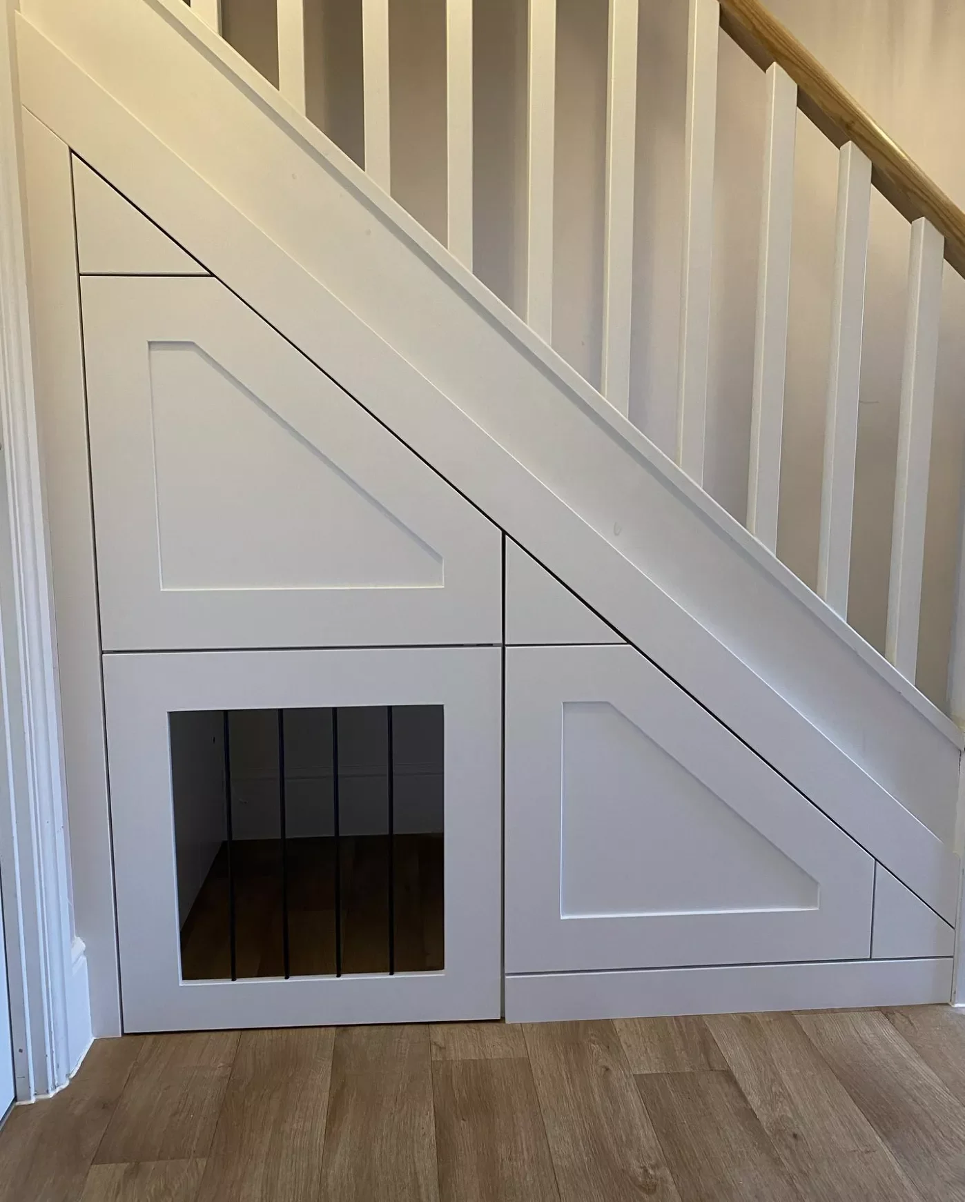 10 Stylish Dog Food Storage Solutions That Blend Into Your Home Decor Transform a Stair Nook into a Dog Nook