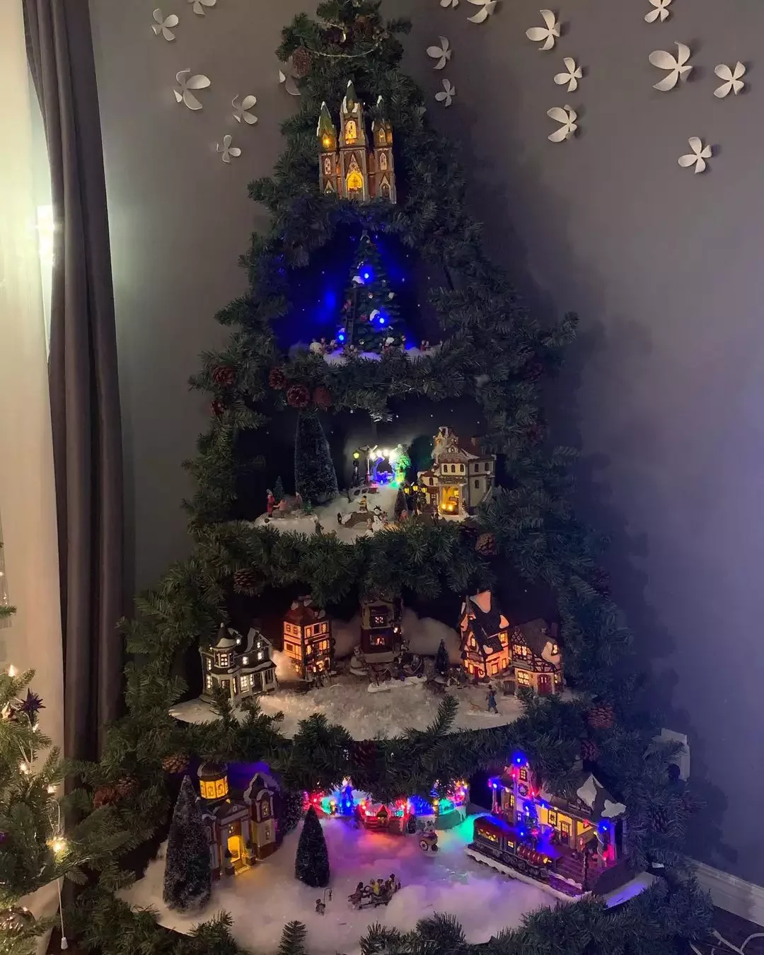 20 Magical Christmas Village Display Ideas That Will Transform Your Home Into a Winter Wonderland 11 Tree-Shaped Village