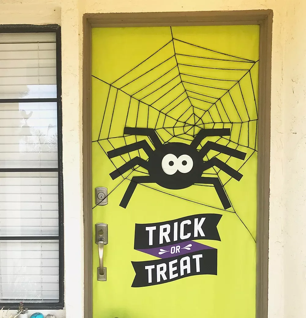42 Quick Halloween Door Decorations You Can Create in Under an Hour 27 Trick or Treat Door Sign