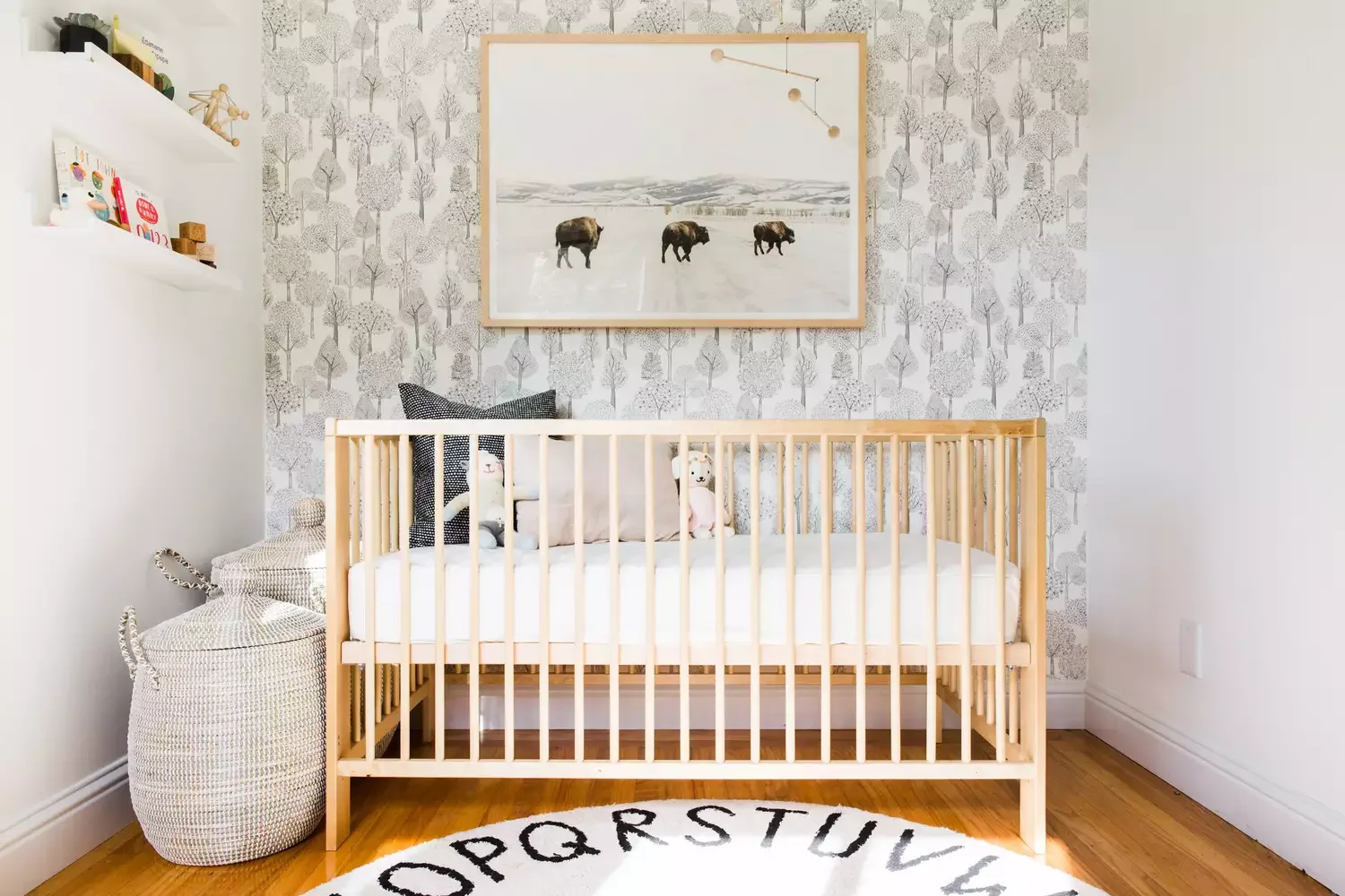 19 Creative Nursery Accent Wall Ideas to Transform Your Baby's Room 14 Try Forest-Themed Wallpaper