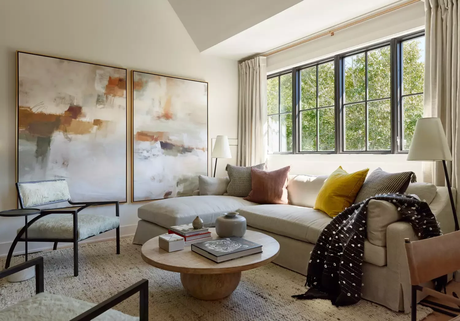 50 Elegant Living Room Ideas That Feel Warm and Inviting 16 Try Large-Scale Wall Art