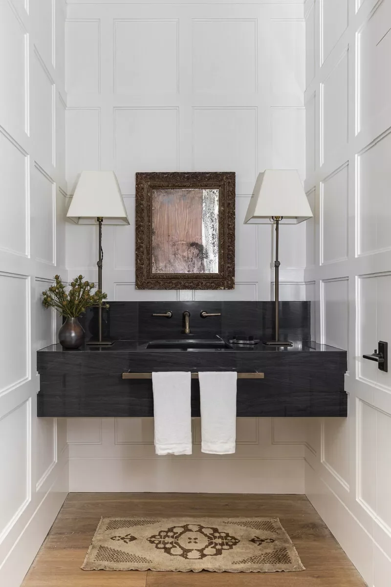 22 Clever Ways to Make Your Narrow Bathroom Feel Spacious and Stylish 14 Try Tall Standing Lamps