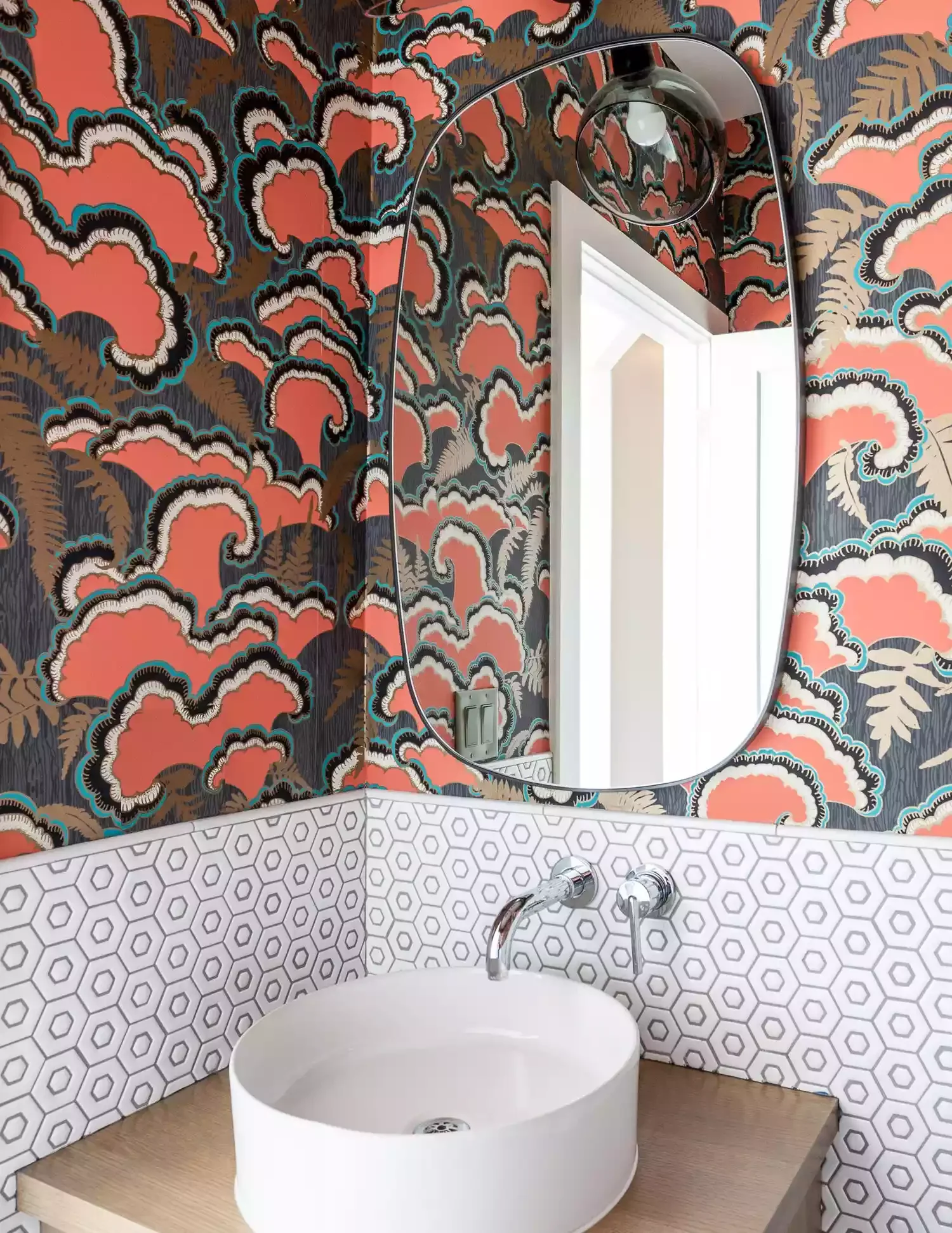 22 Clever Ways to Make Your Narrow Bathroom Feel Spacious and Stylish 6 Try a Corner Sink