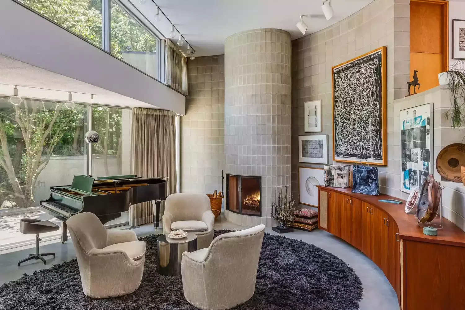 57 Stunning Fireplace Decorating Ideas to Transform Your Living Space 3 Try a Curved Fireplace