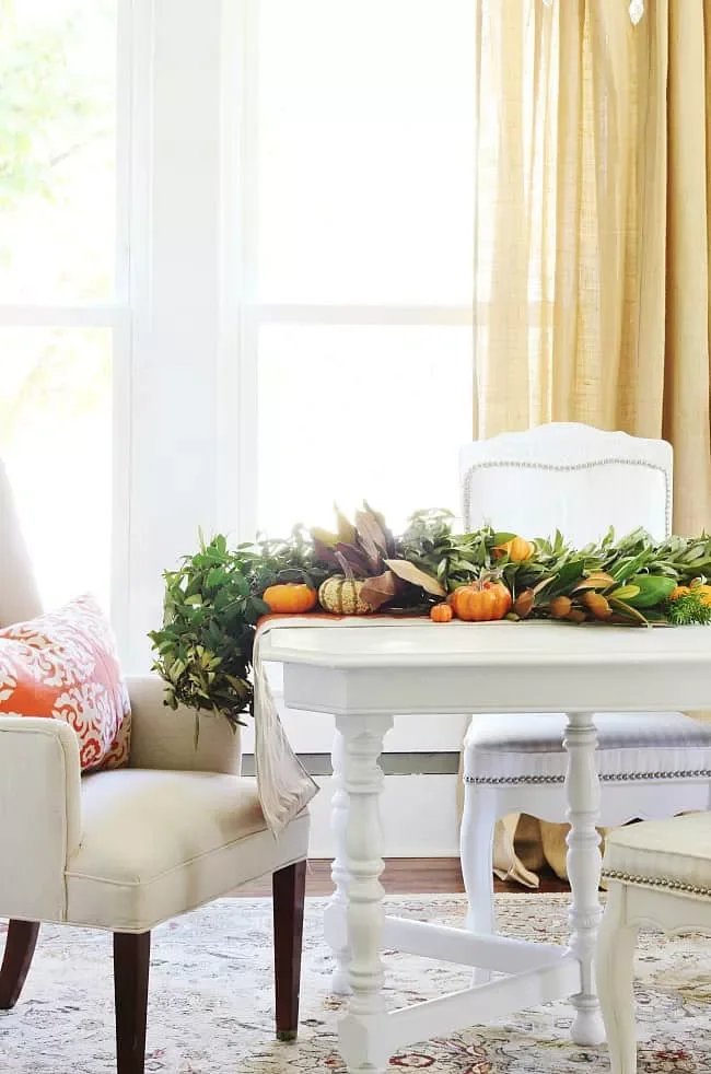 78 Beautiful Fall Table Decorating Ideas to Transform Your Seasonal Celebrations 28 Try a Fall Garland
