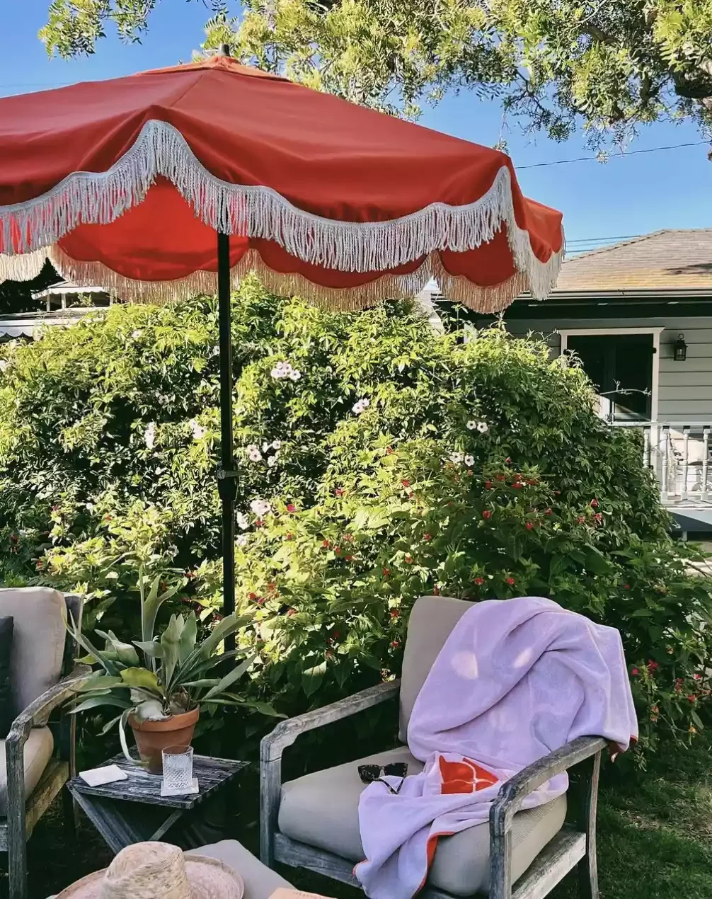 60 Garden Decor Ideas That Transform Your Outdoor Space Try a Fringed Umbrella
