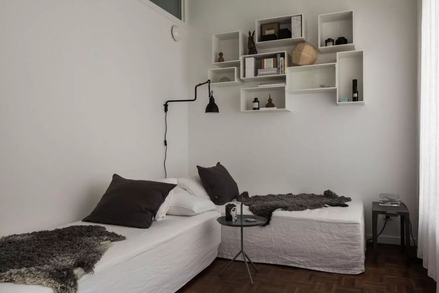 22 Smart Ways to Fit Two Beds in Your Small Bedroom 4 Try a Kitty-Corner Layout