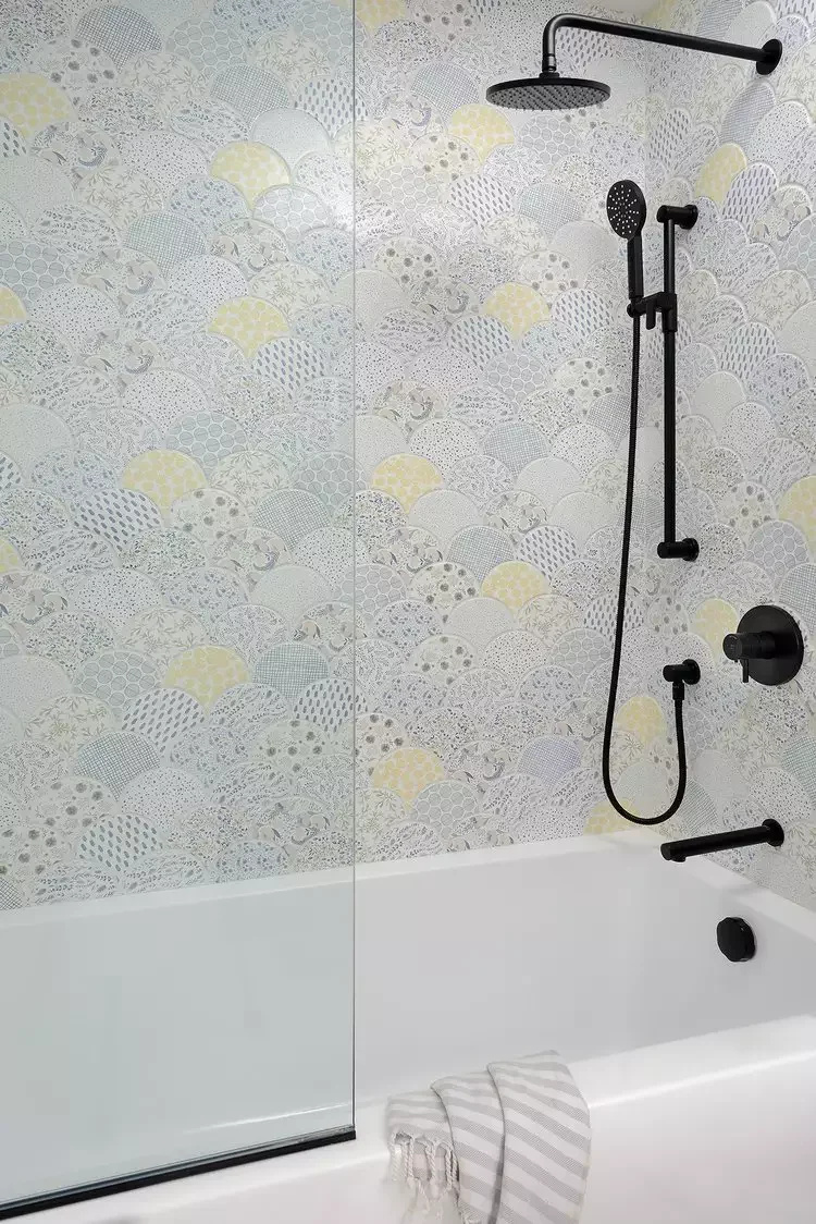 26 Beautiful Bathtub Tile Ideas That'll Transform Your Shower-Tub Into a Designer Masterpiece 10 Try a Patchwork Pattern
