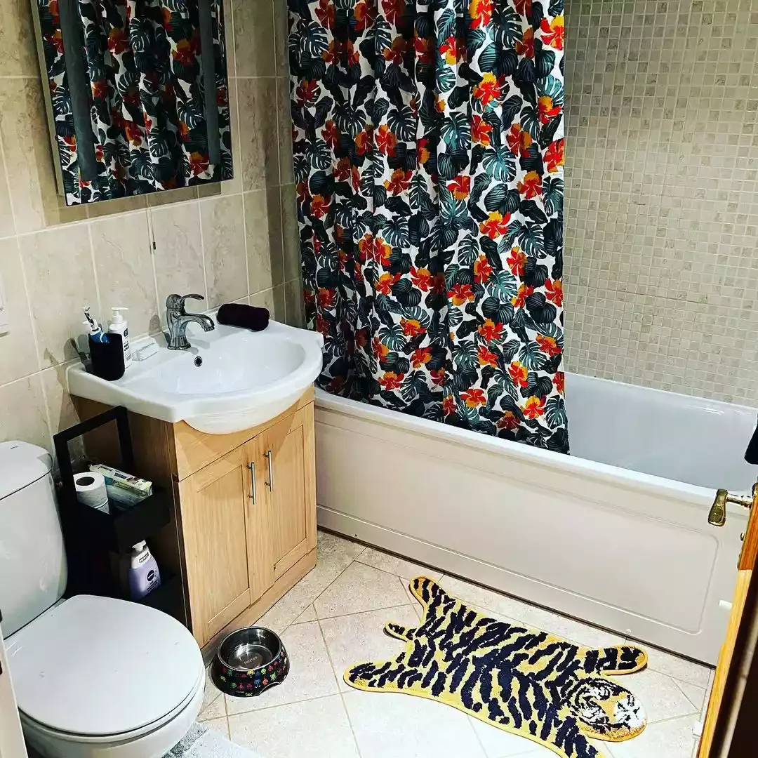 23 Brilliant Bathroom Rug Ideas That Will Transform Your Space 13 Try a Playful Shape