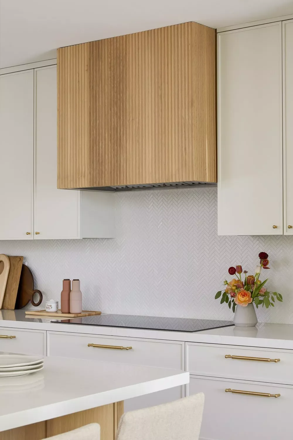 30 Stunning Range Hood Designs That Transform Your Kitchen 21 Try a Reeded Design