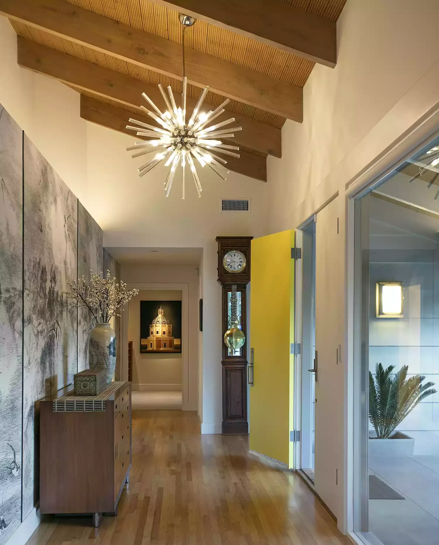 40 Stunning Entryway Lighting Ideas That Will Transform Your Home's First Impression Try a Sputnik Sphere Chandelier