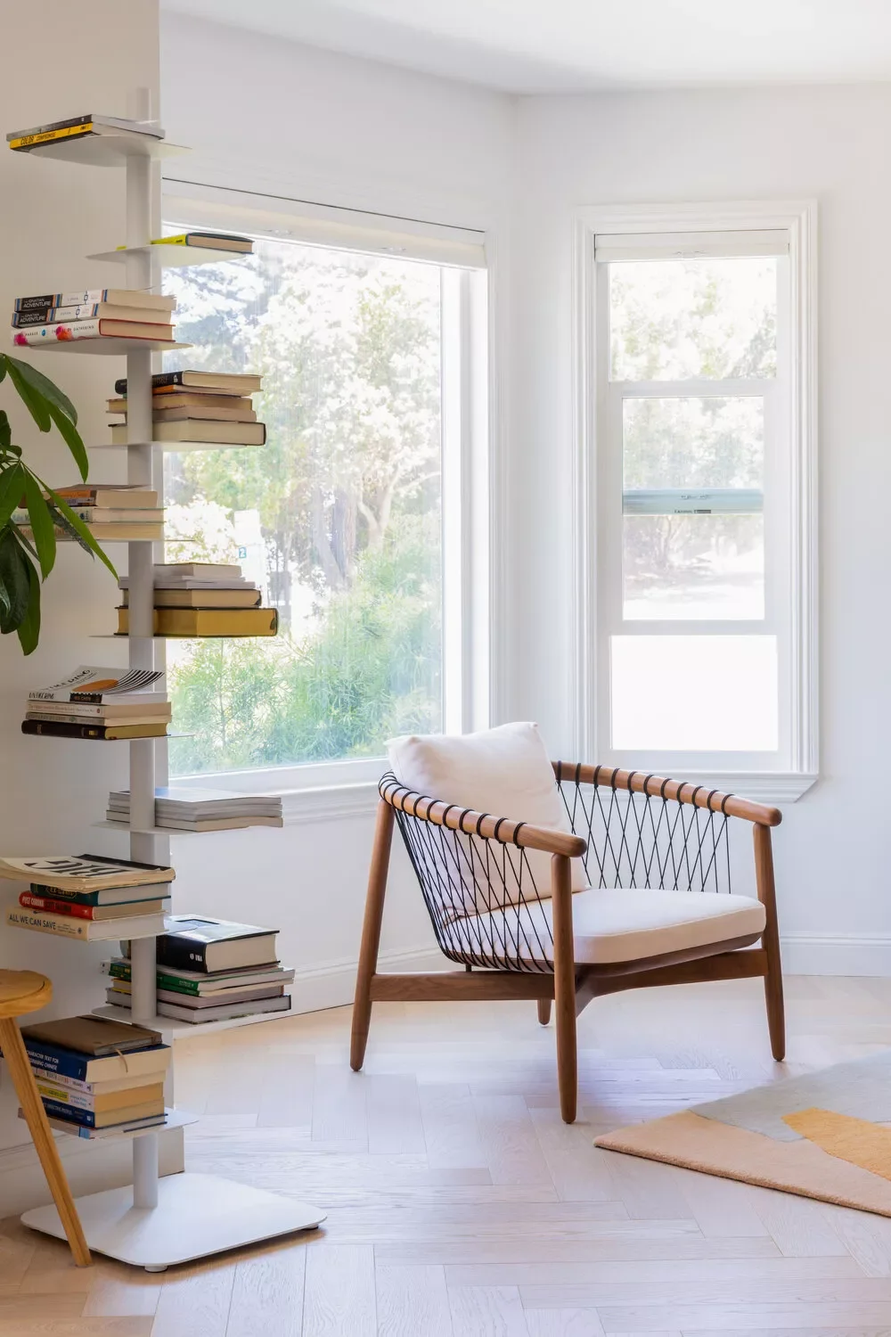 47 Brilliant Small Living Room Ideas That Make Every Square Foot Count 47 Try a Standalone Book Tower