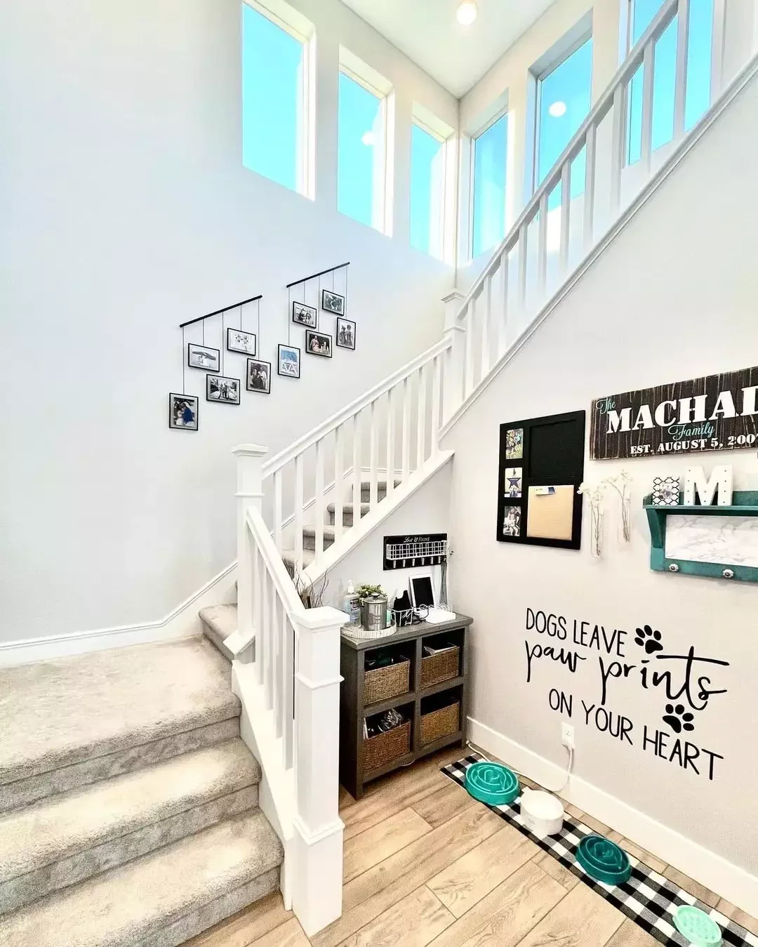 30 Creative Staircase Wall Decorating Ideas That Will Transform Your Space 26 Try an Alternative Picture Hanging Technique
