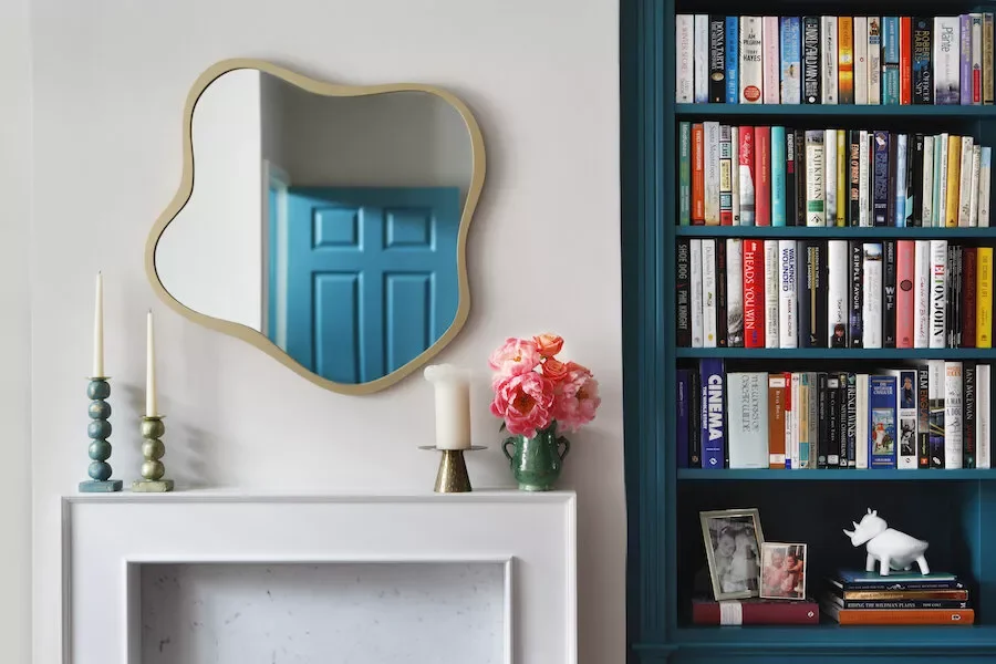 51 Creative Fireplace Mantel Decorating Ideas That Will Transform Your Living Space 21 Try an Organic Mirror Shape