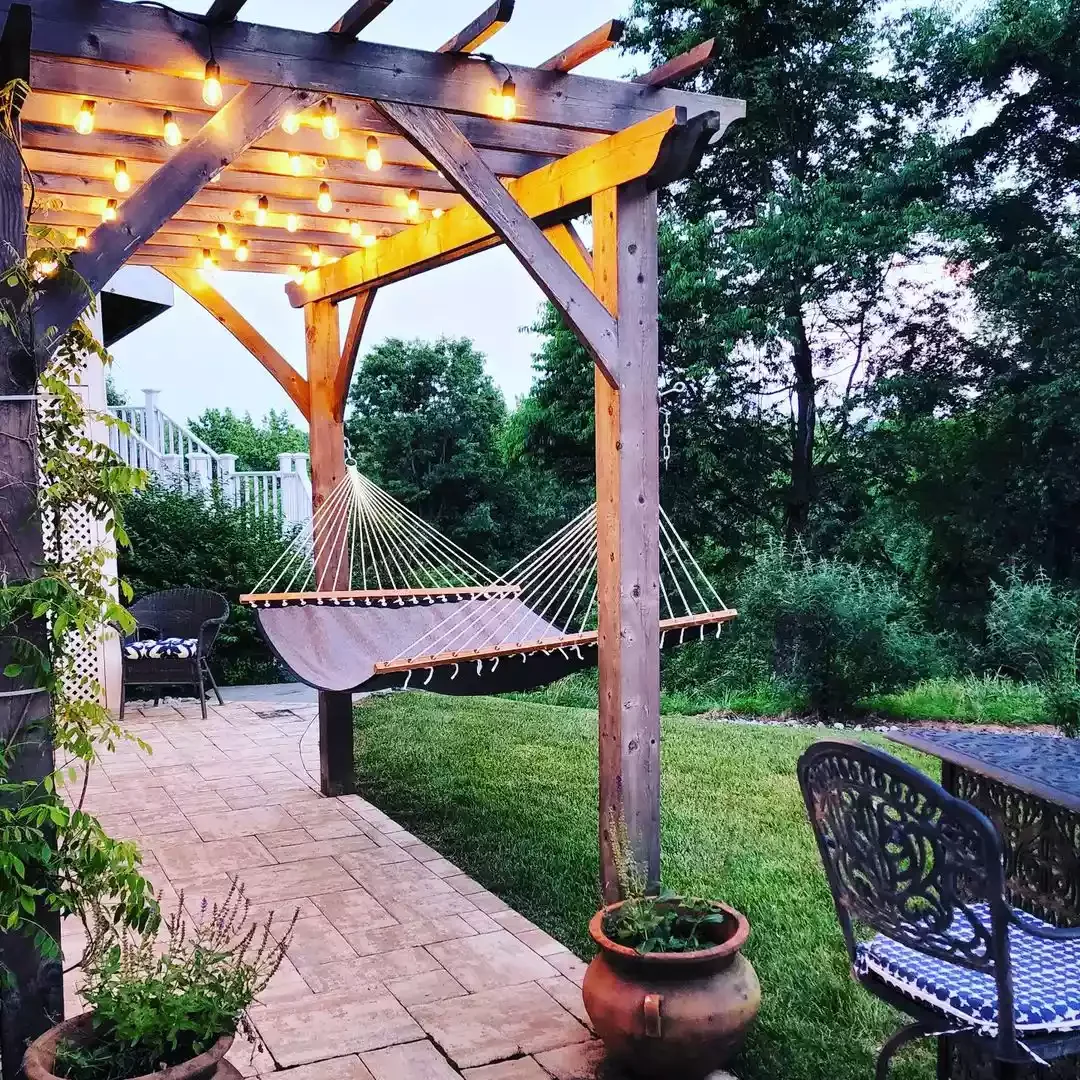 29 Stunning Backyard Hammock Ideas to Create Your Perfect Relaxation Retreat 21 Under a Pergola
